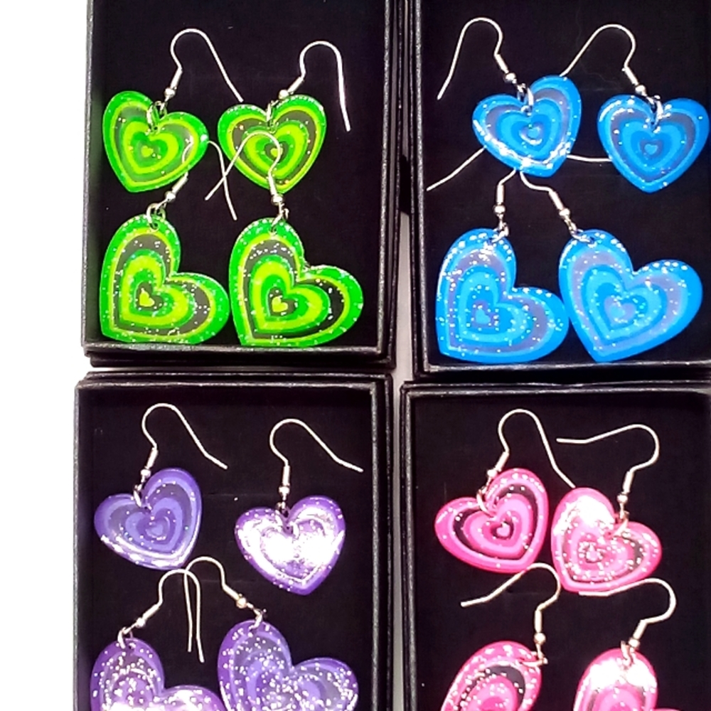 8 pairs of heart earrings. Pink, blue, green and purple NWT